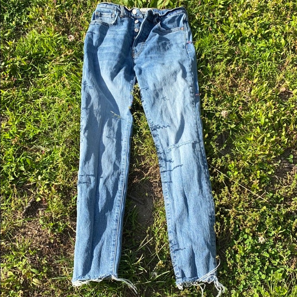 High Wasted Size 26 Button up jeans.